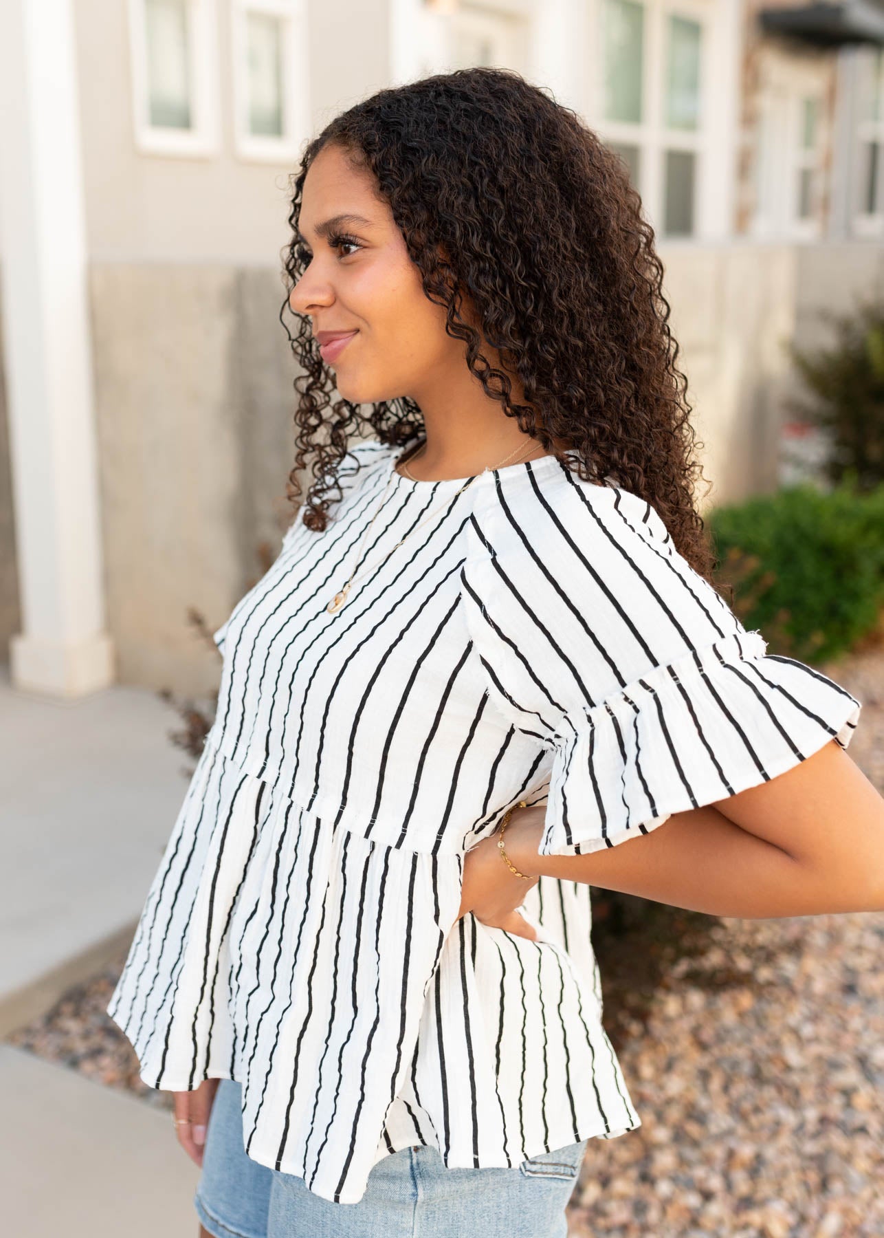 Brynn Black Striped Peplum Top